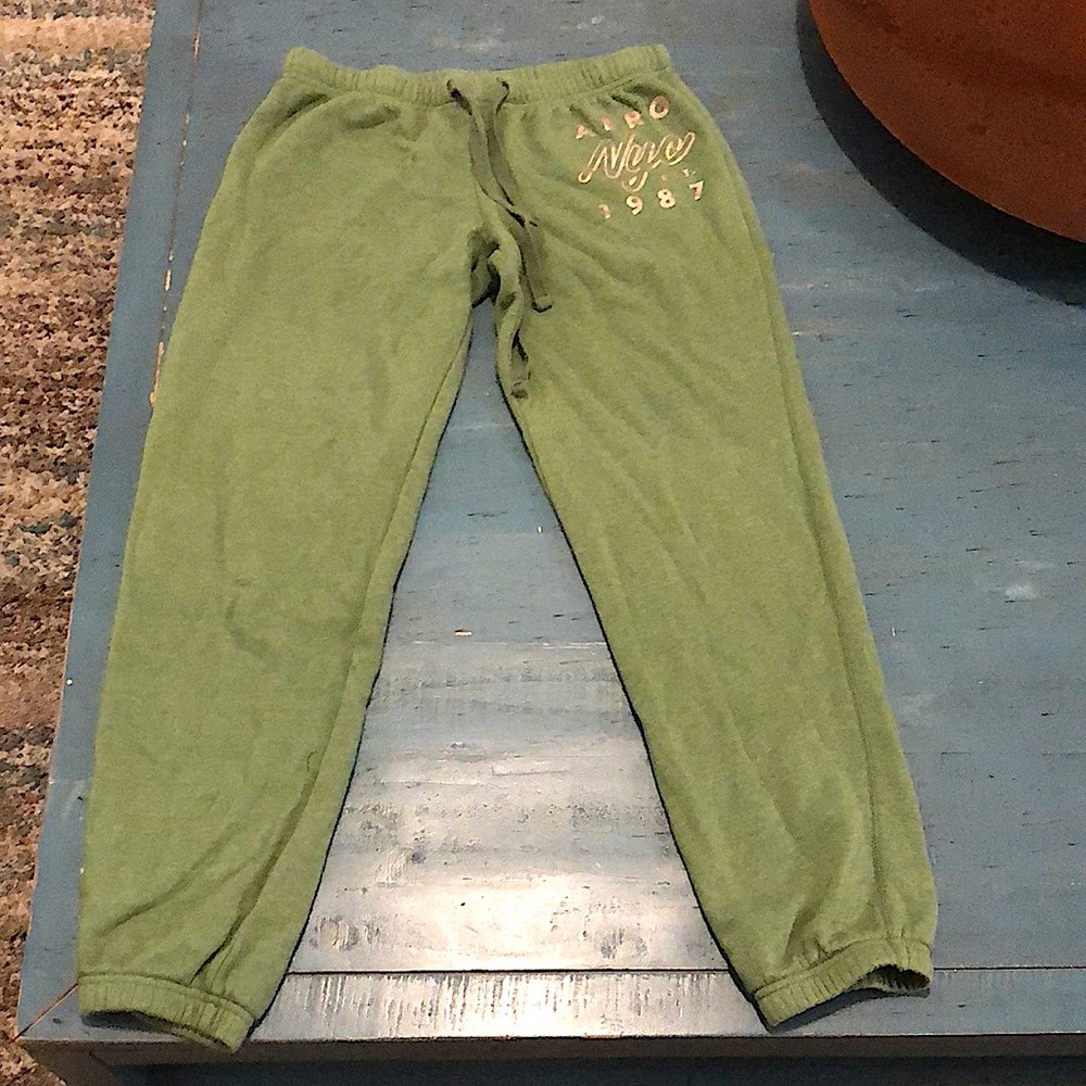 Im selling joggers they are a large in size they are a light green they and warm